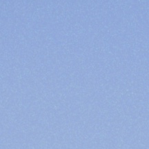 The same sky on 16mm: clearly grainy, with visible clumping across the whole crop.